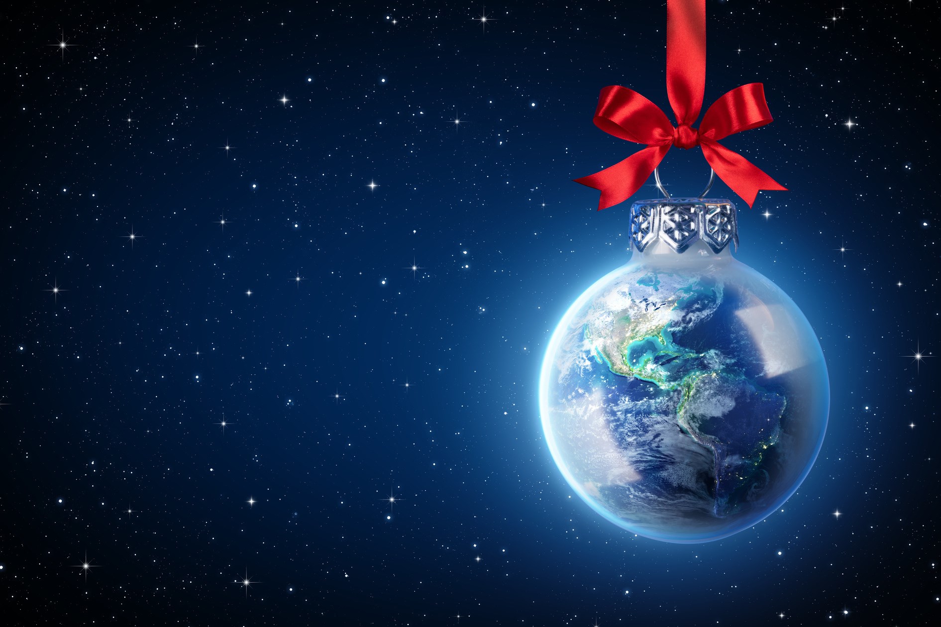 Earth as a Christmas ball with red bow