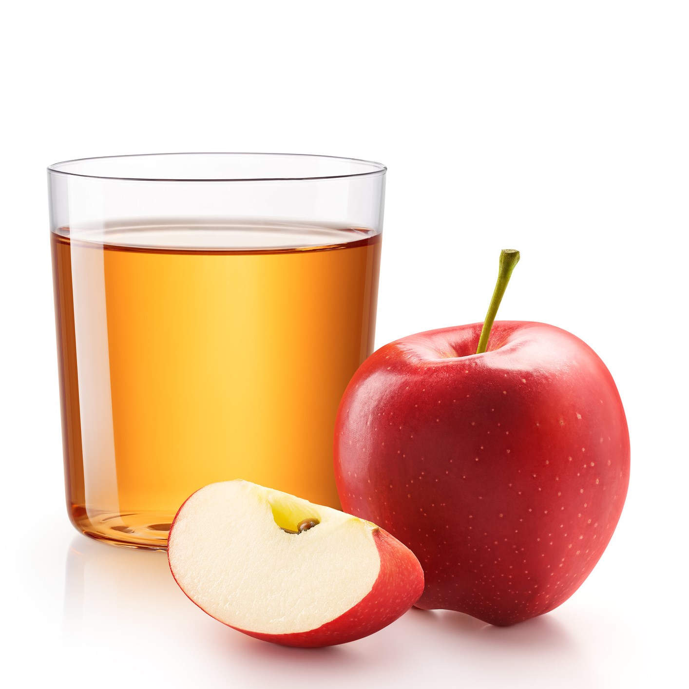 A glass of apple juice with red apples isolated on white background