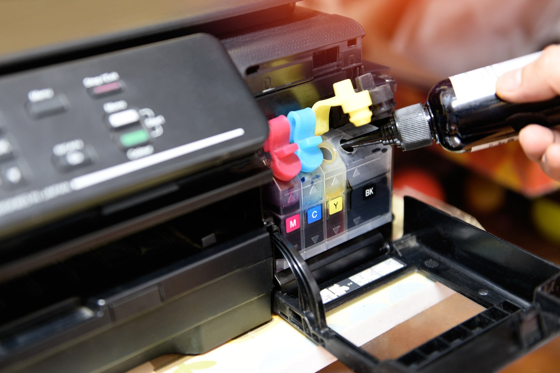 refill ink tank printer at office - Close up printer cartridge inkjet of color black CMYK and repair fix the problem concept , selective focus