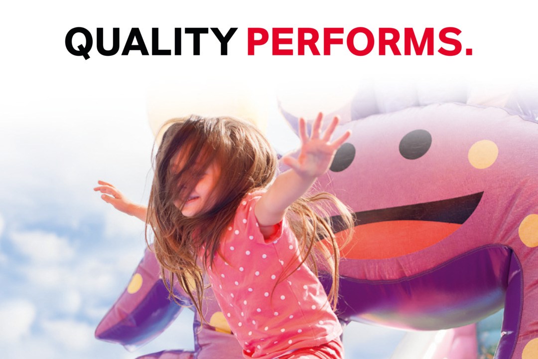 Quality Performs - Girl is jumping on a bouncy castle