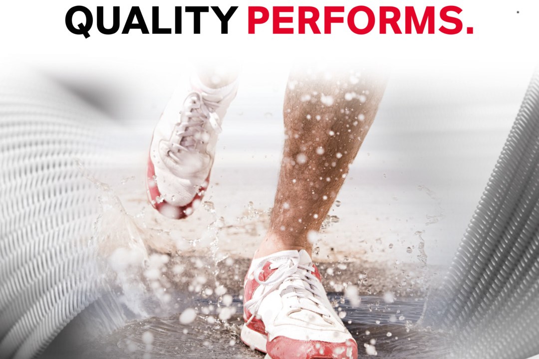Quality Performs - running shoes through puddle. Stabaxol brochure
