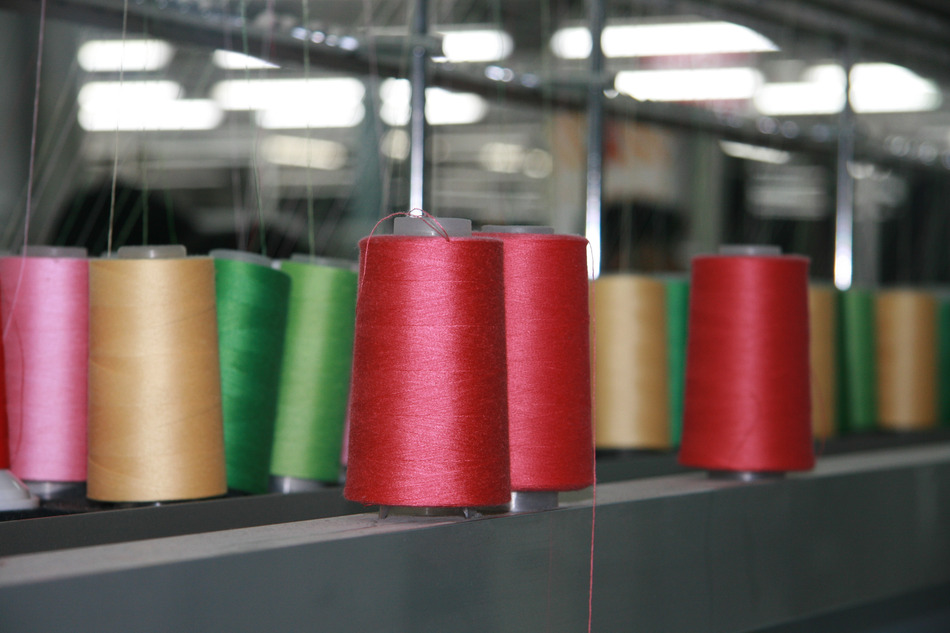 Coloured yarn on rolls 